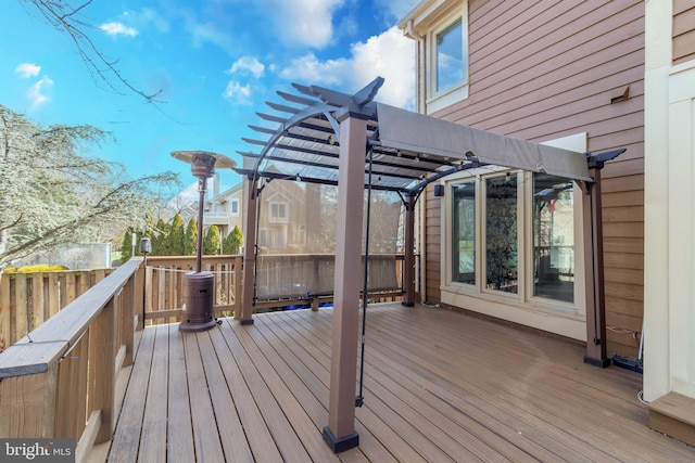 wooden deck with a pergola