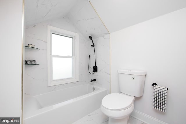 bathroom with baseboards, toilet, lofted ceiling,  shower combination, and marble finish floor