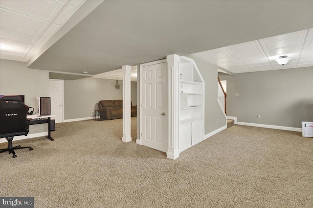 home office featuring carpet and baseboards