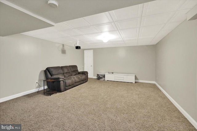 living area with carpet flooring and baseboards