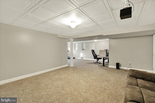 interior space featuring carpet floors, an ornate ceiling, and baseboards