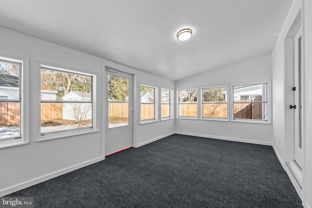 unfurnished sunroom with lofted ceiling