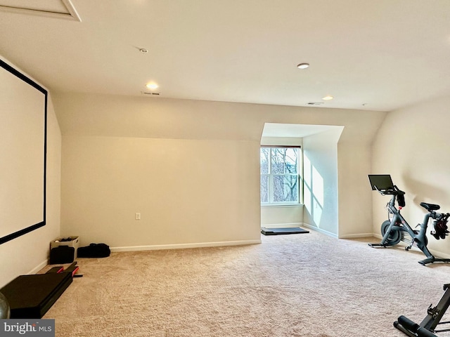 workout area featuring baseboards, recessed lighting, visible vents, and light colored carpet