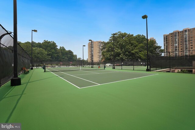 view of sport court with fence