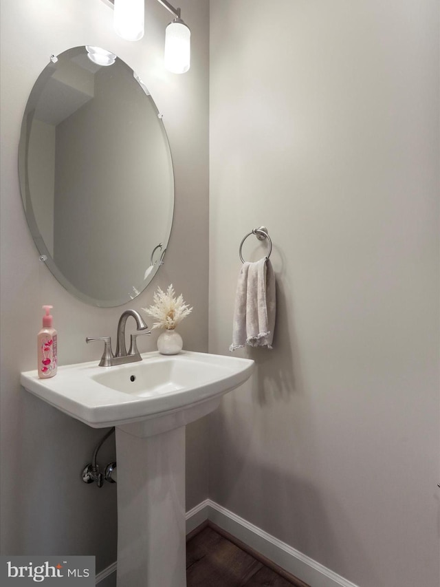 bathroom featuring baseboards