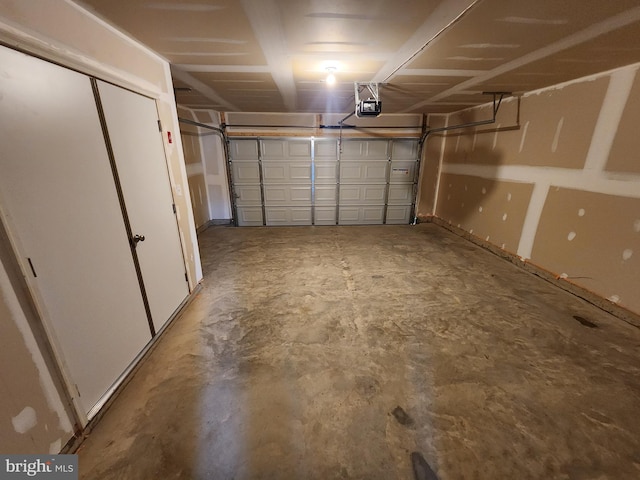 garage featuring a garage door opener