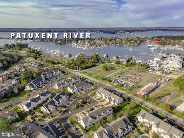 aerial view featuring a residential view and a water view