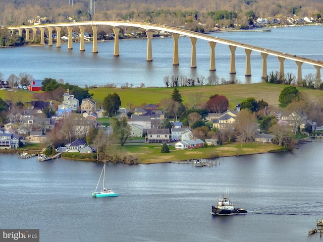 bird's eye view with a residential view and a water view