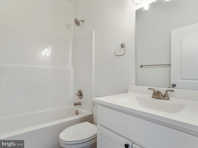 full bathroom featuring toilet, vanity, and shower / bathing tub combination