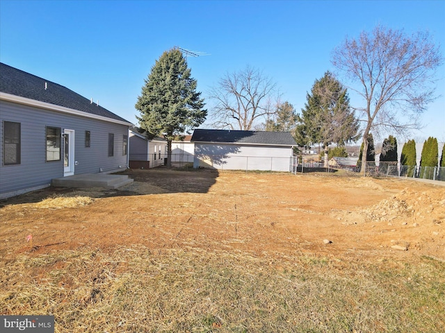 view of yard with a patio and fence