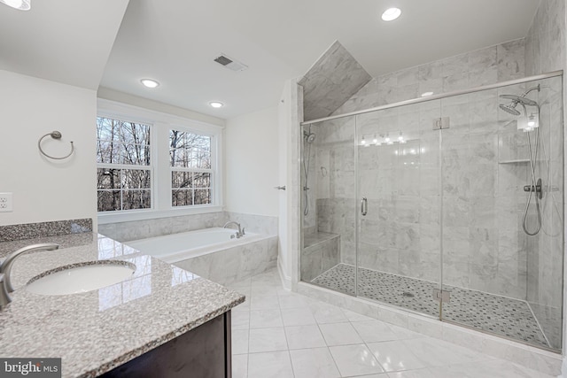 full bath featuring tile patterned flooring, a garden tub, vanity, visible vents, and a shower stall