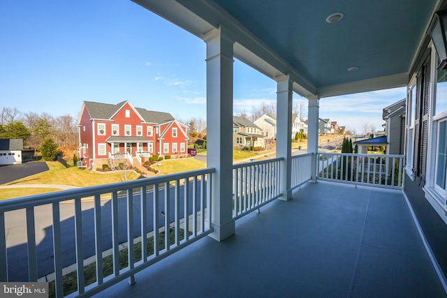 balcony featuring a residential view