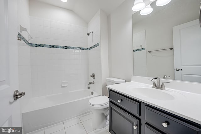 bathroom featuring tile patterned flooring, shower / tub combination, vanity, and toilet