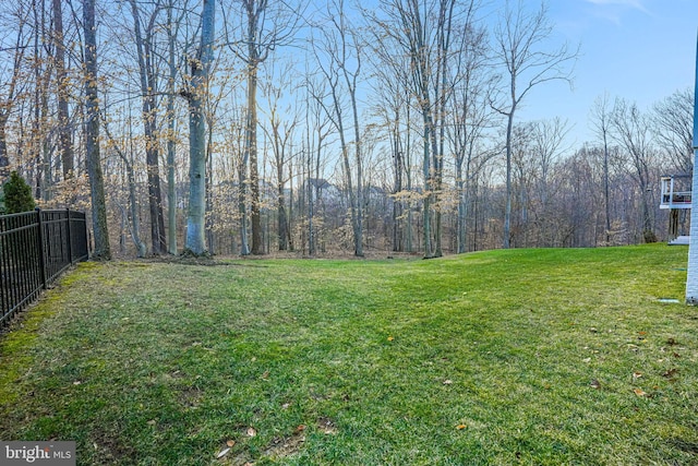 view of yard with fence