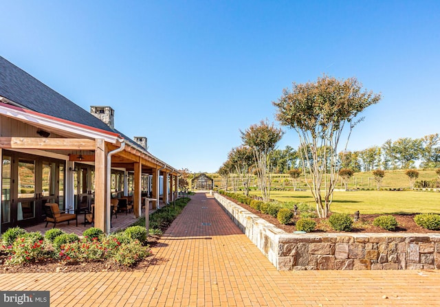 surrounding community featuring a patio