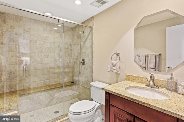 full bathroom with toilet, recessed lighting, vanity, visible vents, and a shower stall