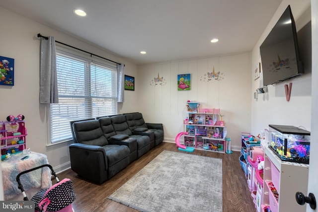 game room with recessed lighting, dark wood finished floors, and baseboards