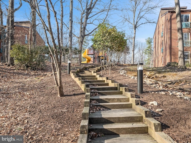 view of yard with stairway and playground community