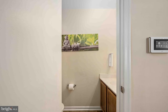 bathroom featuring vanity and baseboards