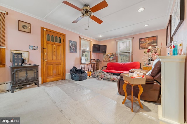 living room featuring light carpet, a ceiling fan, crown molding, and recessed lighting