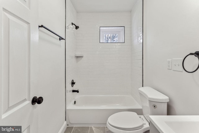 bathroom featuring shower / bath combination, vanity, toilet, and tile patterned floors