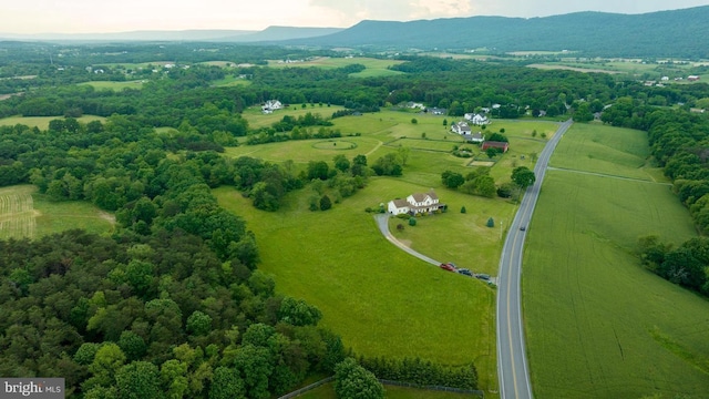 aerial view featuring a rural view and a mountain view