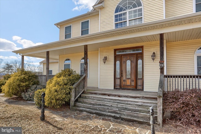 entrance to property with covered porch