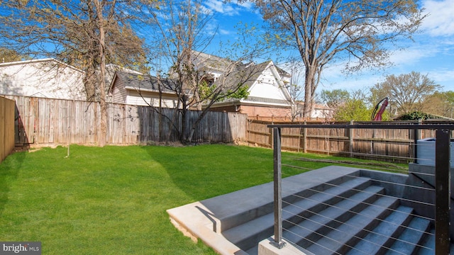 view of yard featuring a fenced backyard