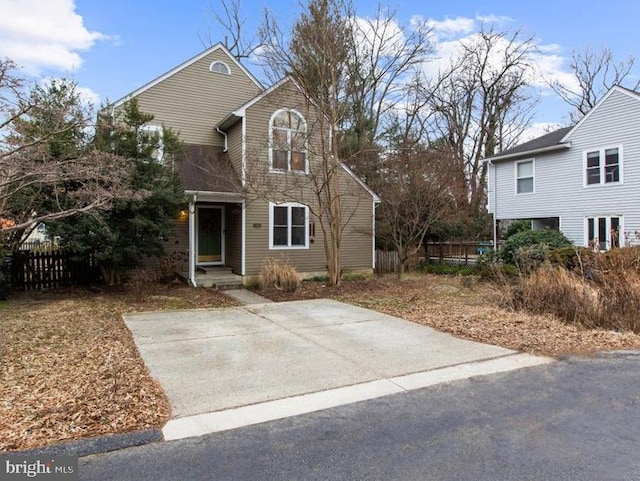 traditional home with fence