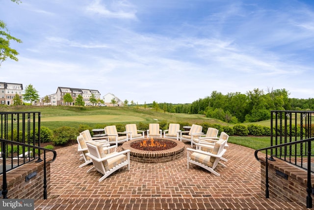 view of patio featuring an outdoor fire pit