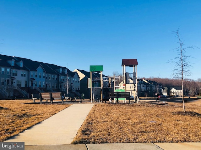 community playground featuring a residential view