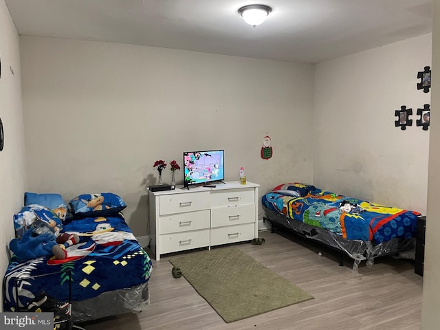 bedroom with light wood-style flooring