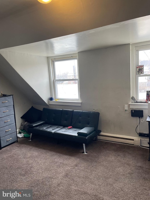 living area featuring carpet floors and baseboard heating