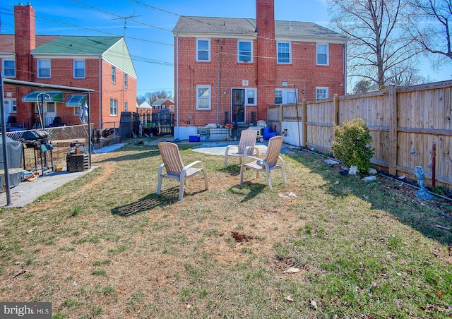 view of yard featuring a fenced backyard