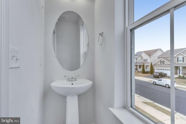 bathroom with a residential view