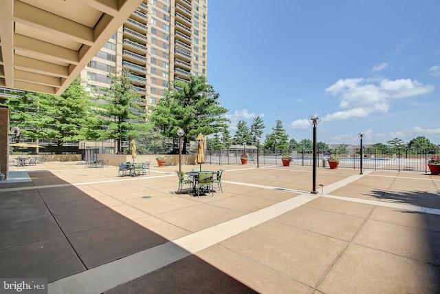 view of patio / terrace featuring fence