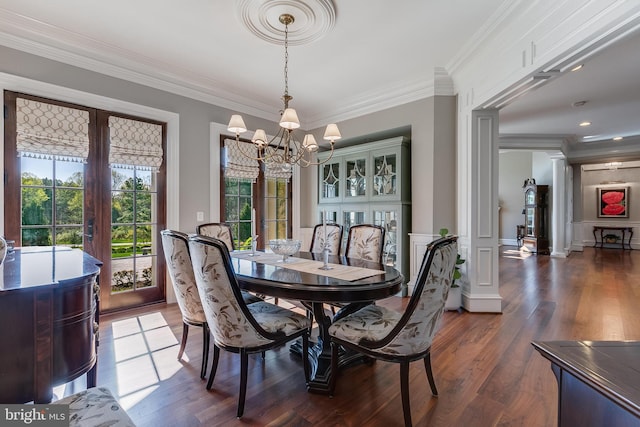 22577 Creighton Farms Dr, Leesburg, VA 20175 - dining area featuring french doors, ornamental molding, a chandelier, and dark wood finished floors