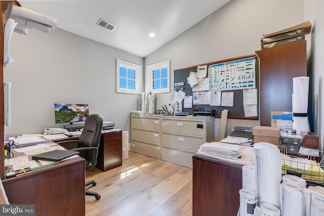 22577 Creighton Farms Dr, Leesburg, VA 20175 - home office featuring hardwood / wood-style floors, vaulted ceiling, visible vents, and recessed lighting