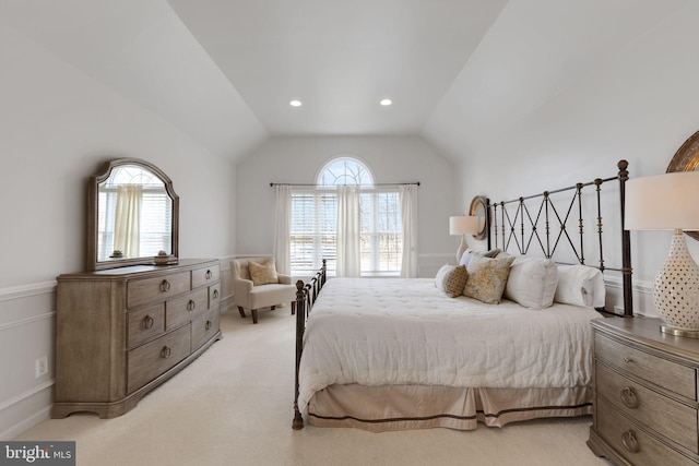 bedroom with lofted ceiling, multiple windows, light carpet, and recessed lighting