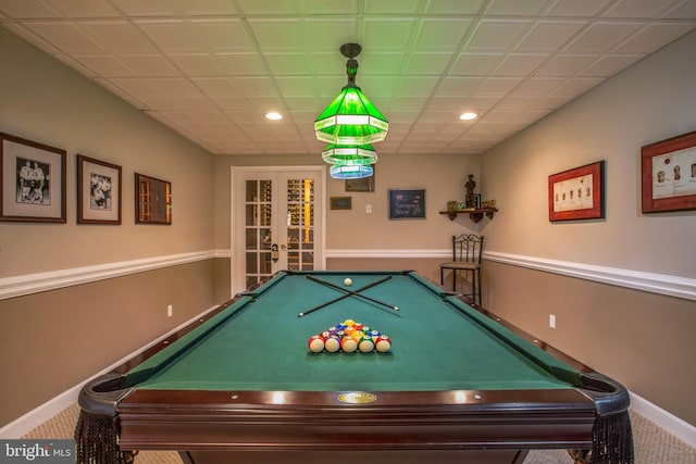 rec room with carpet floors, recessed lighting, baseboards, and french doors