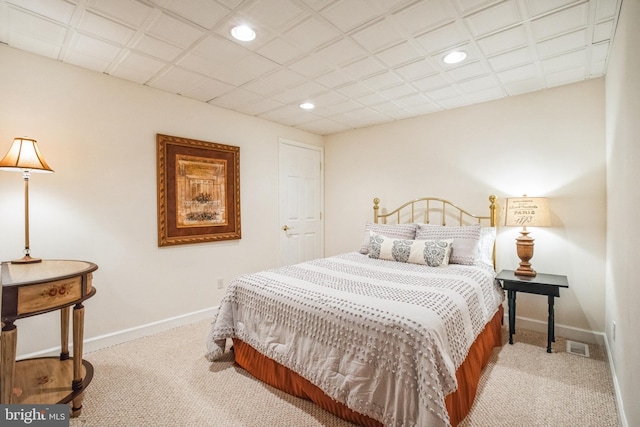 bedroom featuring baseboards, light colored carpet, and recessed lighting