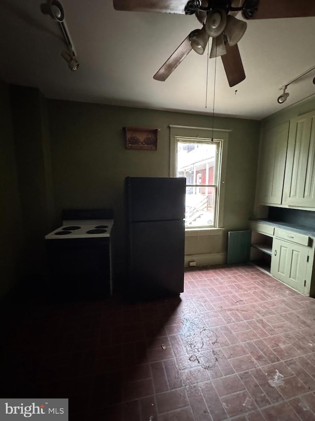 interior space with brick floor and ceiling fan