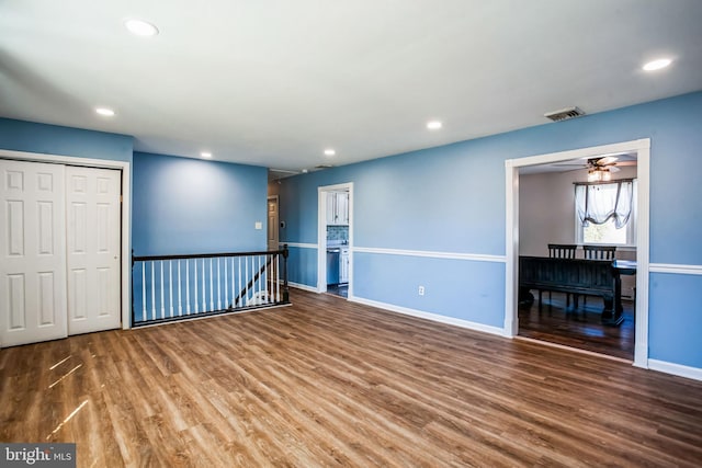 interior space featuring wood finished floors, visible vents, and recessed lighting