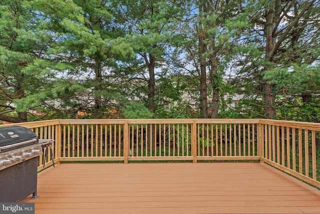 deck featuring a grill