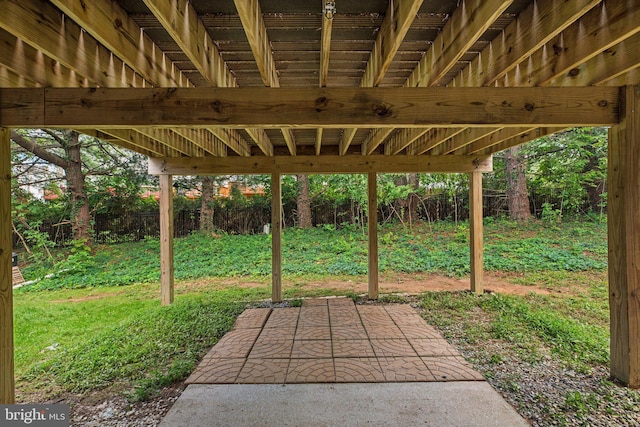 view of patio featuring fence