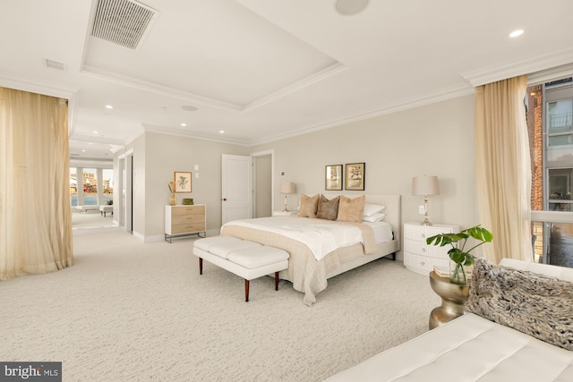 bedroom featuring a tray ceiling, recessed lighting, visible vents, ornamental molding, and light carpet