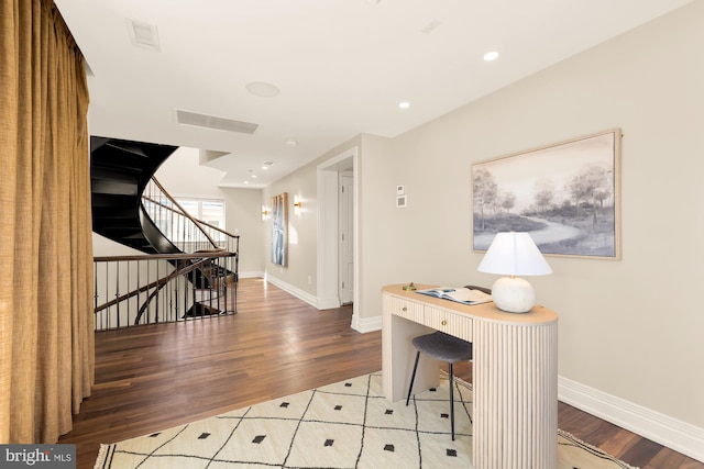 interior space featuring light wood-style flooring, visible vents, baseboards, and recessed lighting