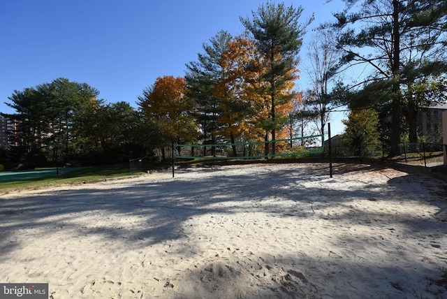 view of yard featuring volleyball court