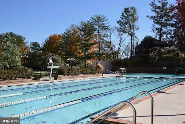 community pool with fence