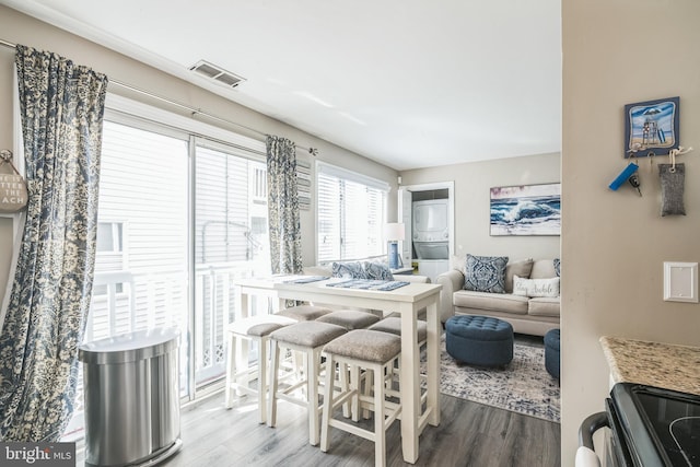 interior space with visible vents and wood finished floors